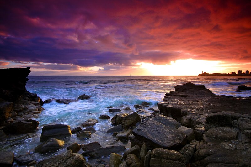 Vibrant sunset over rocky coast
