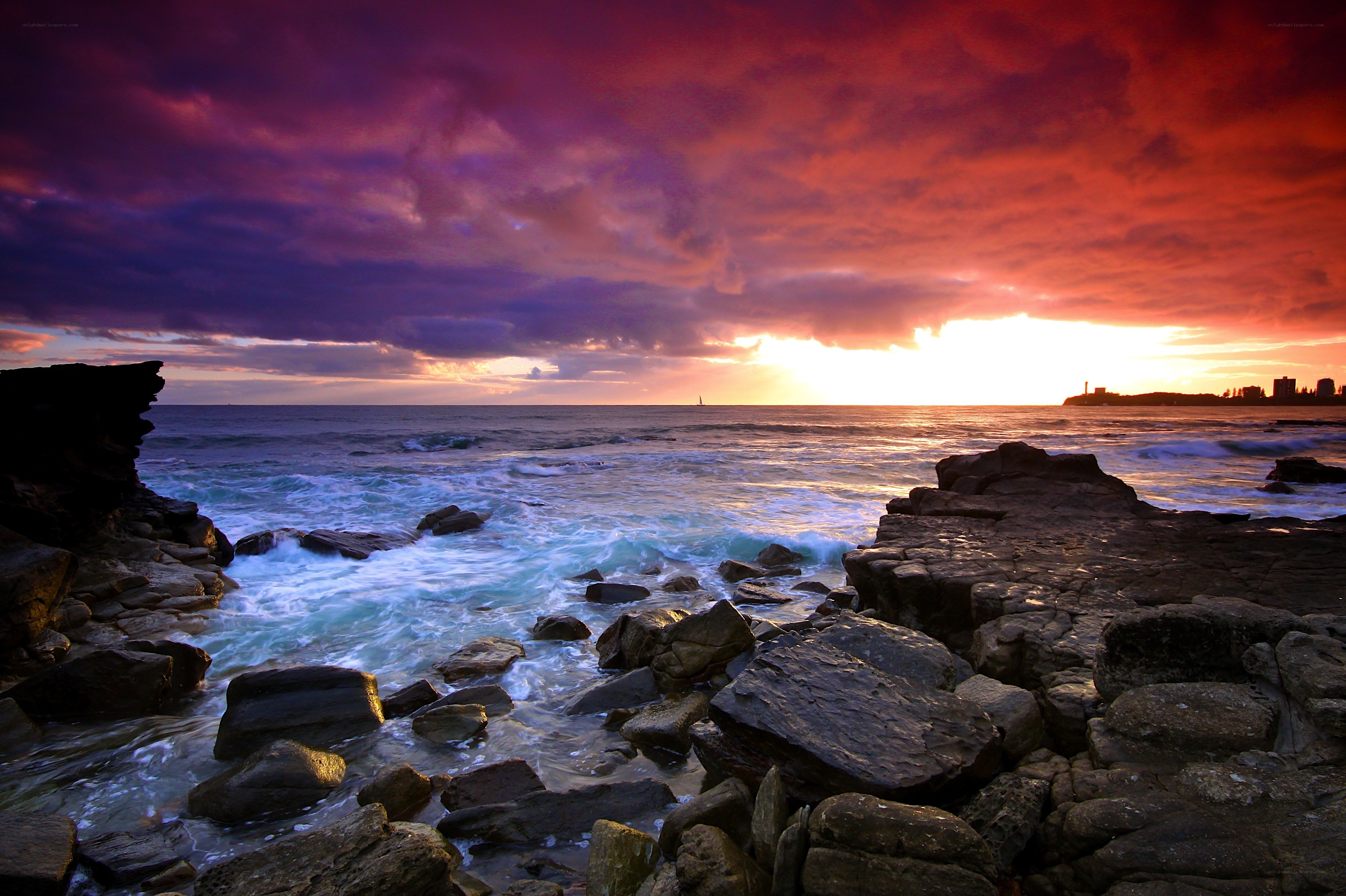 Vibrant sunset over rocky coast
