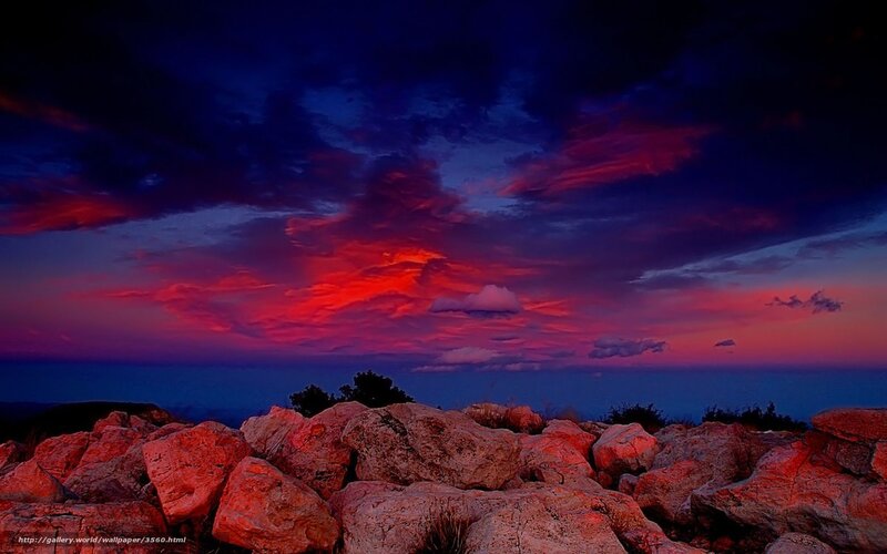 Vibrant sunset over rocky shore