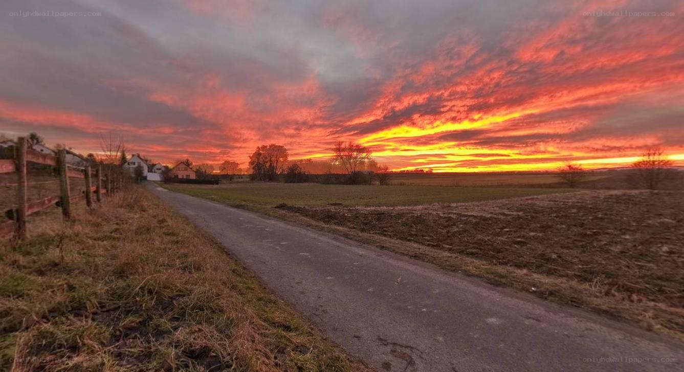 Vibrant sunset over rural road