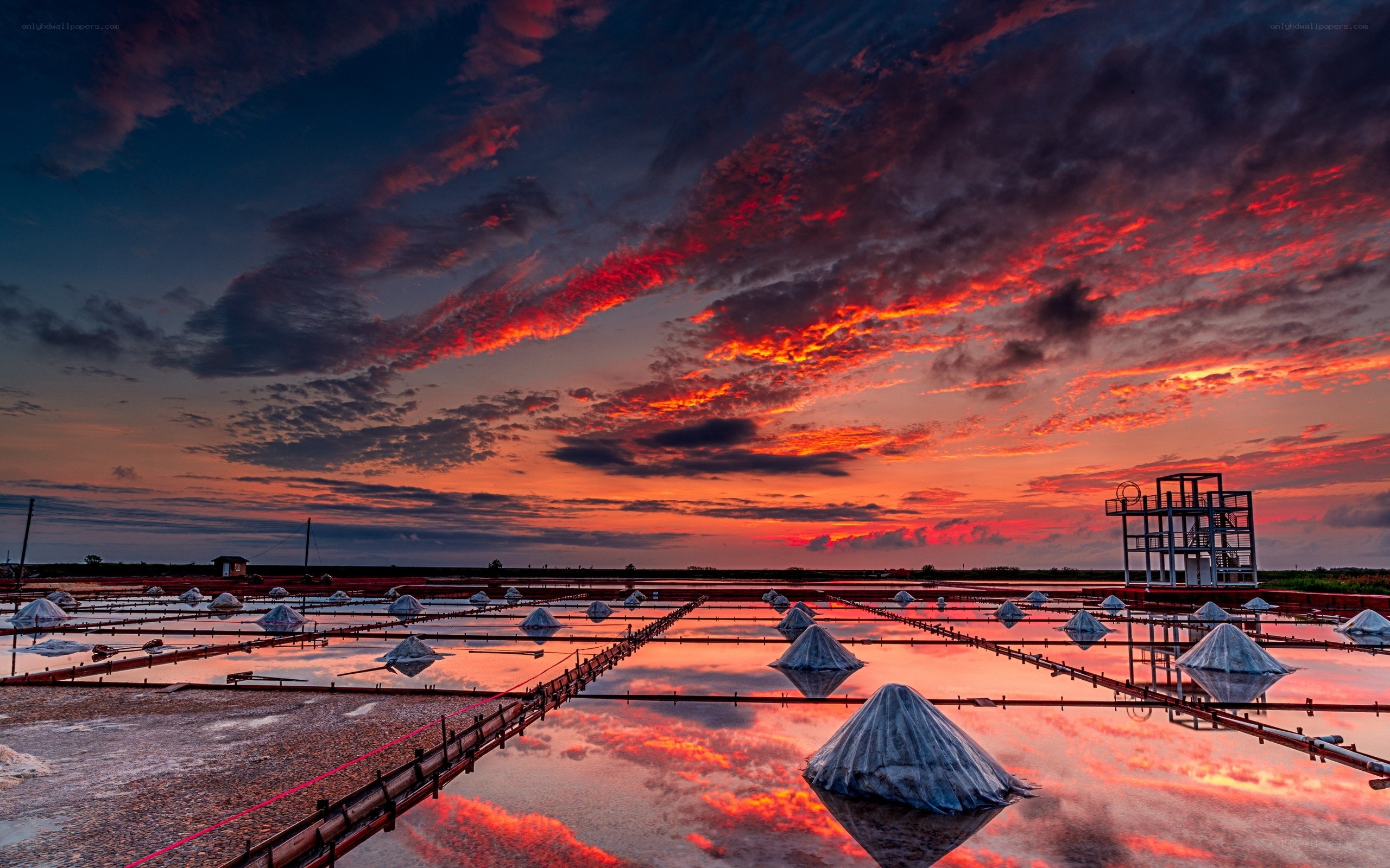 Vibrant sunset over salt pans