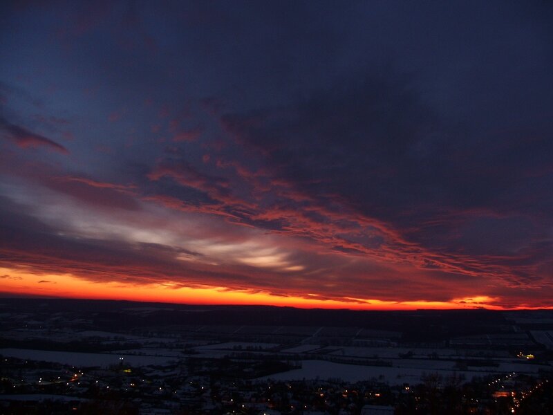 vibrant sunset over snowy landscape