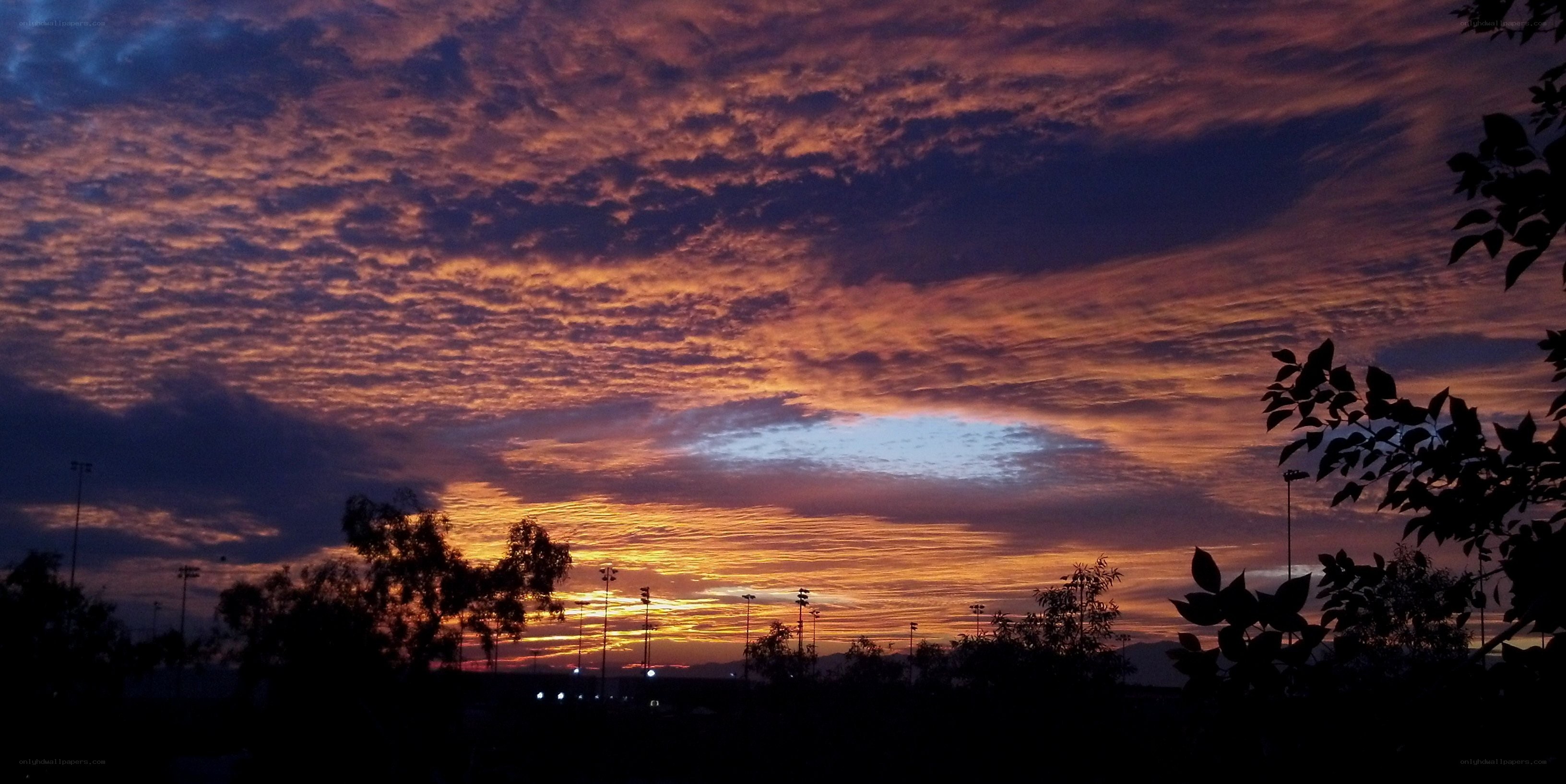 vibrant sunset over sports fields