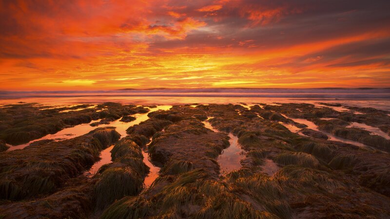 Vibrant sunset over tidal pools