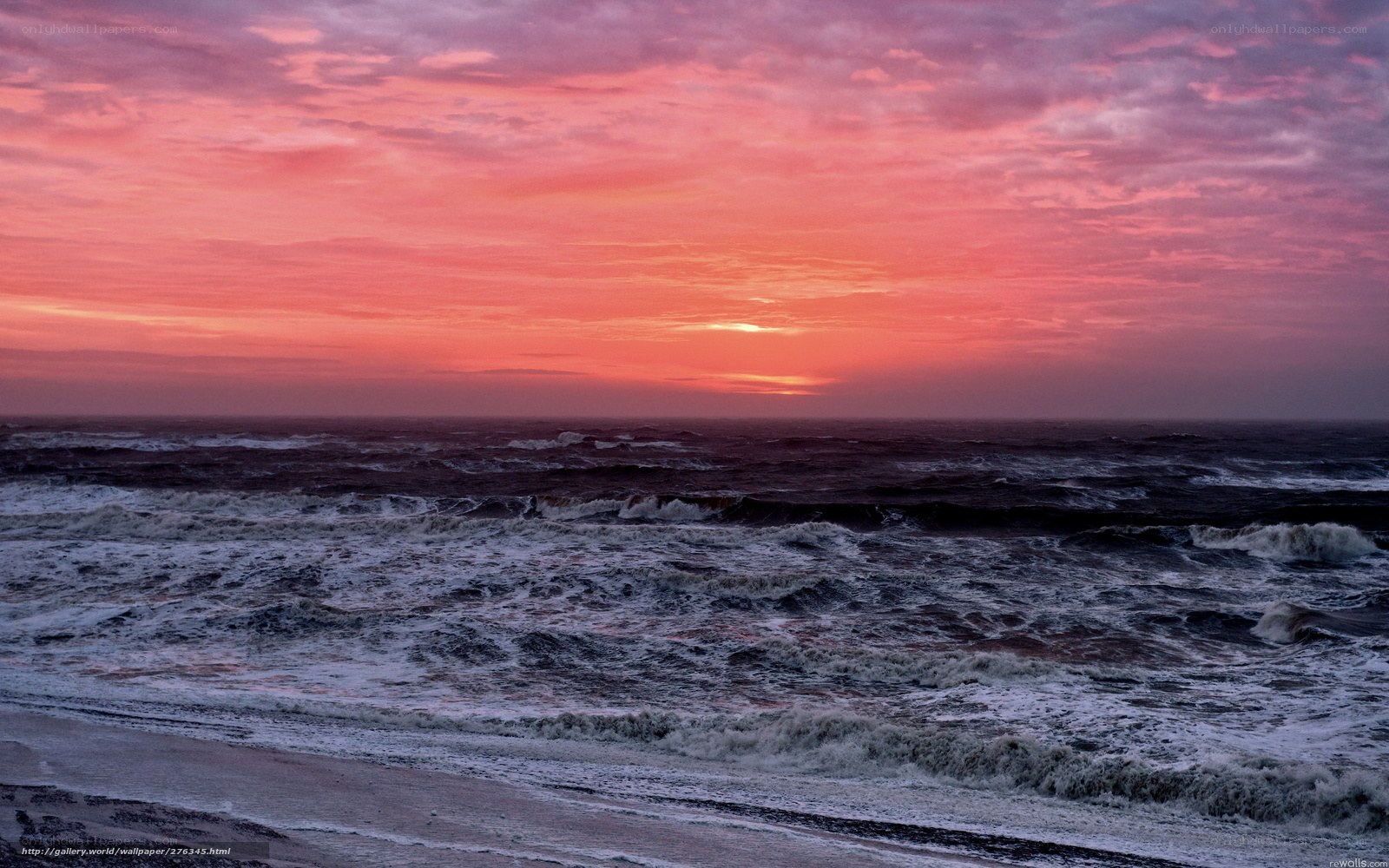 Vibrant sunset over turbulent sea