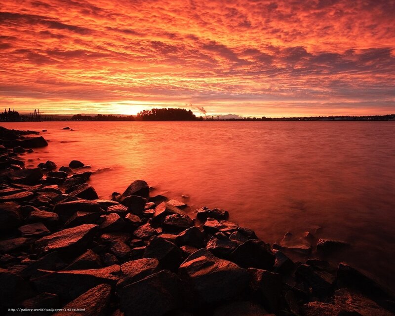Vibrant sunset over water