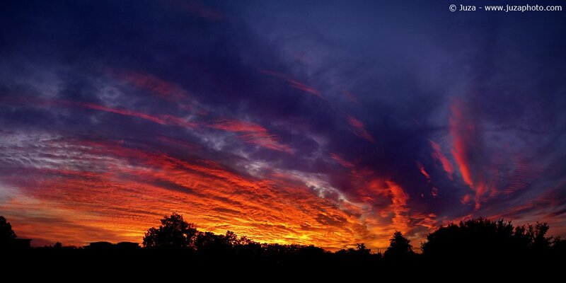 Vibrant sunset with fiery clouds