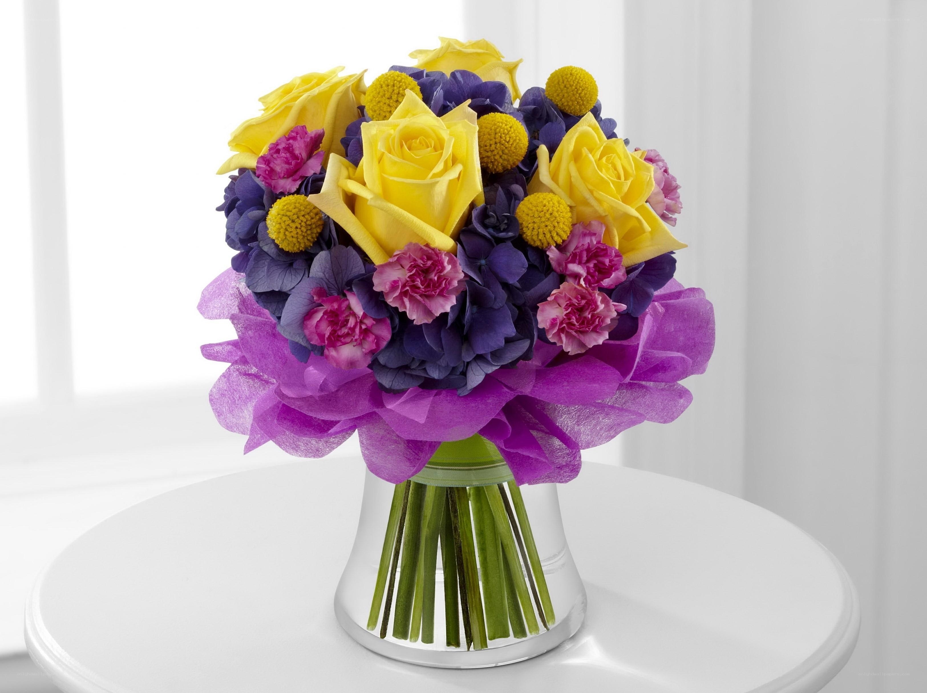 vibrant yellow and purple bouquet