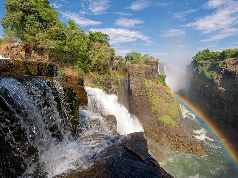 Victoria Falls Waterfall — Blue, Dramatic, Afternoon, Photograph, Rainbow