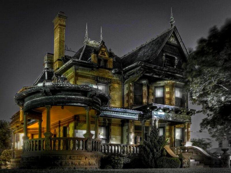 Victorian house at night