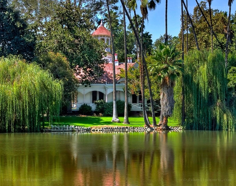 Victorian house by a lake