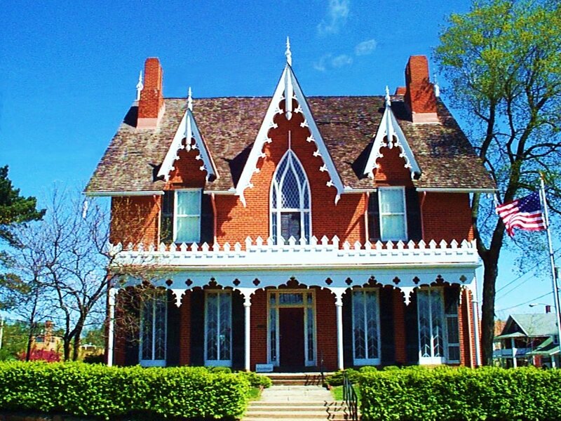 Victorian house with American flag