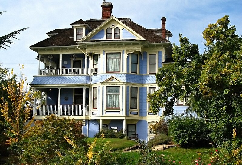 Victorian house with blue siding