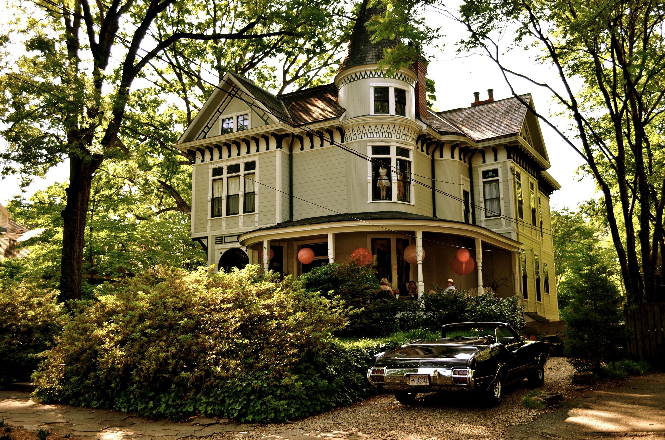 Victorian house with classic car