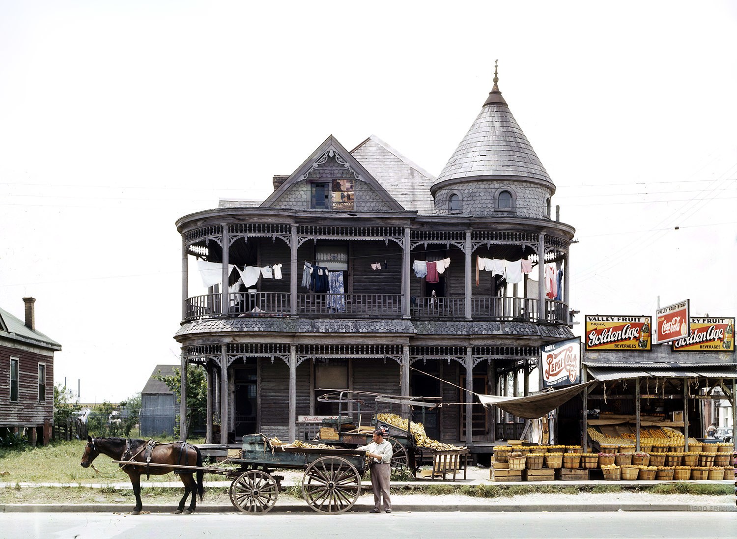 Victorian house with fruit stand