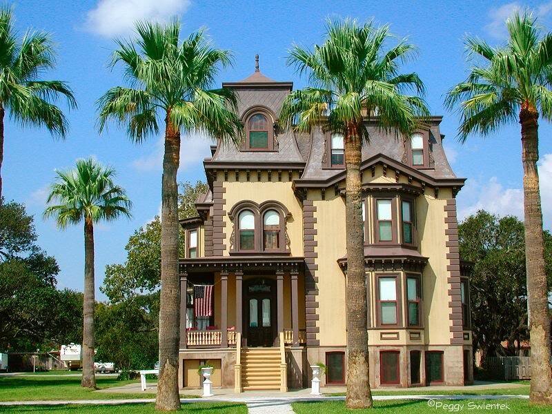 Victorian House with Palm Trees