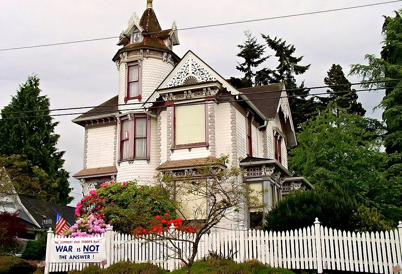 Victorian house with protest sign