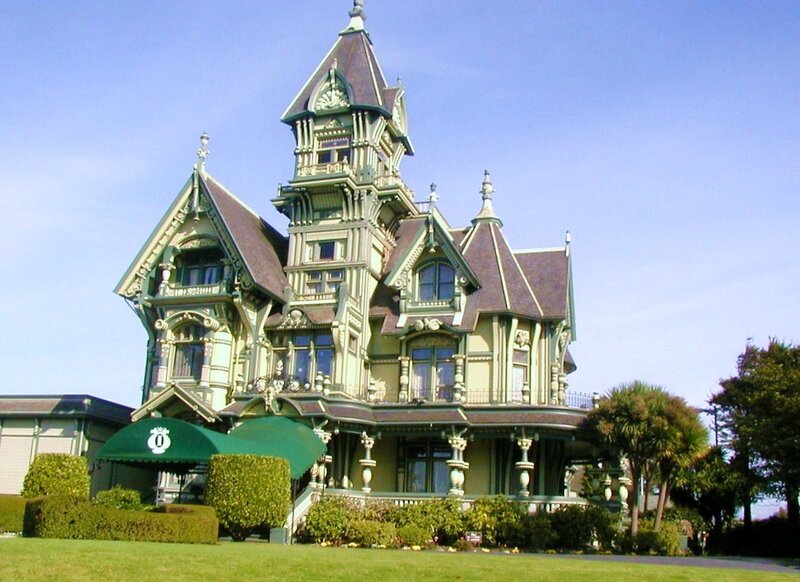 Victorian mansion with green awning