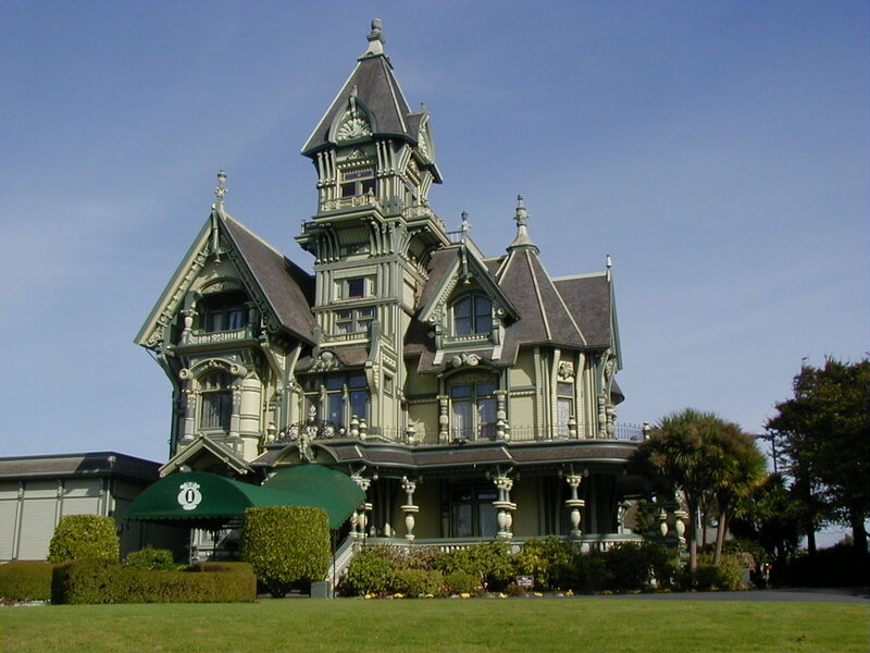 Victorian mansion with green awning