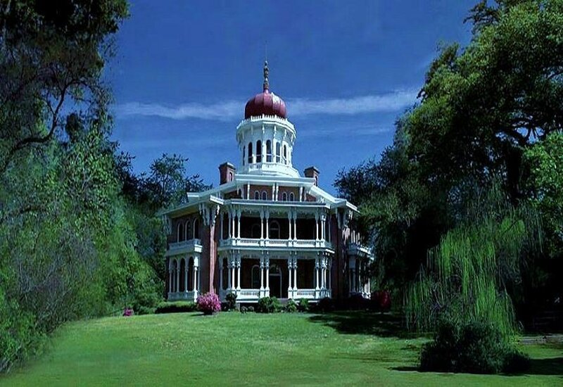 Victorian mansion with red dome
