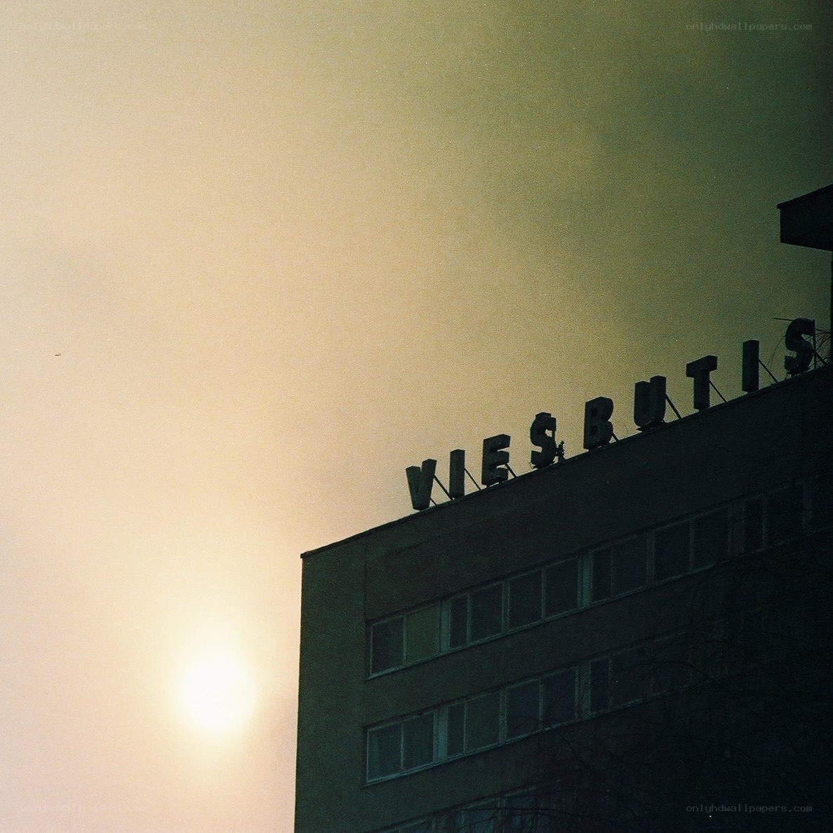 Viesbutis building at sunset