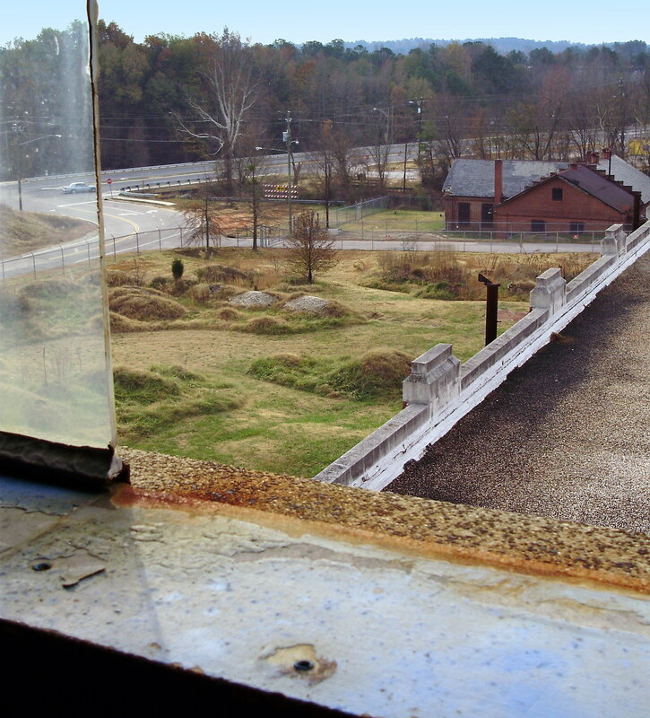 View from a window of a road and buildings