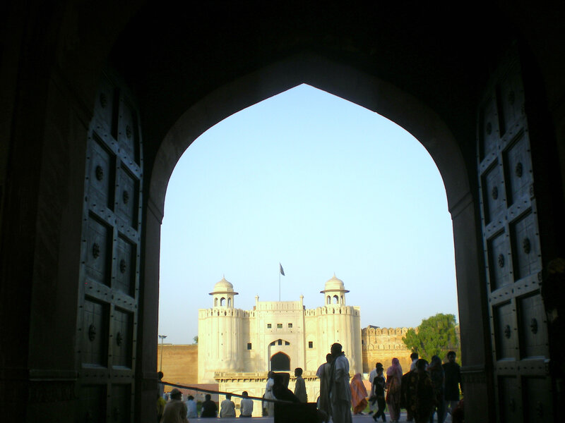 View of a historic fort through an arch