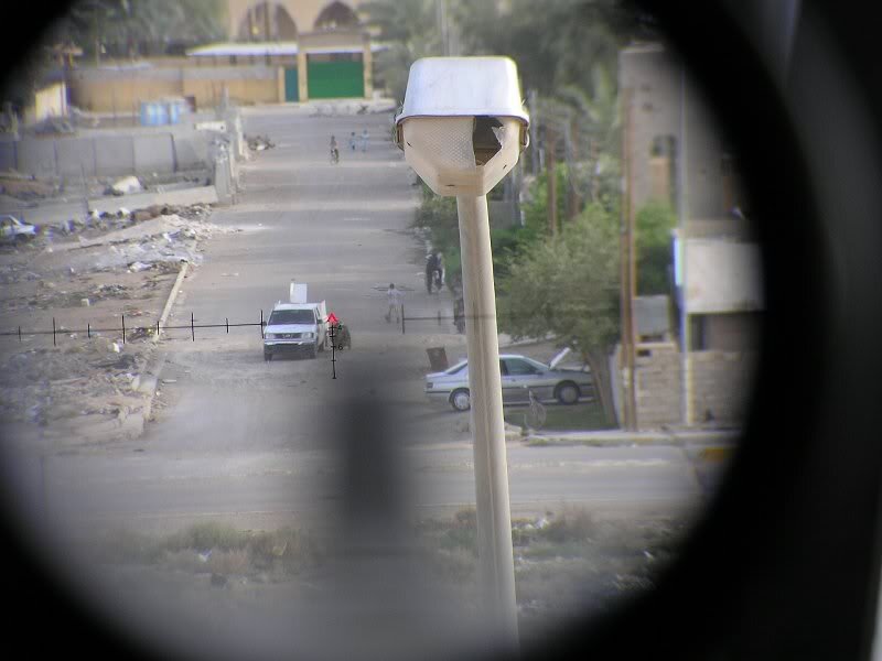 View through a scope of a street