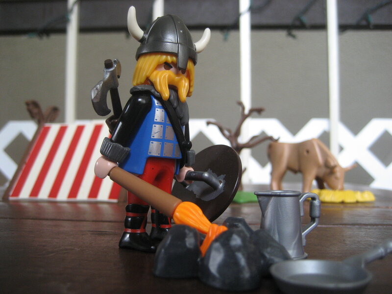 Viking toy figure with camp scene