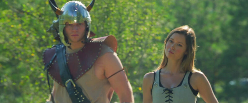 Viking warrior and woman in forest