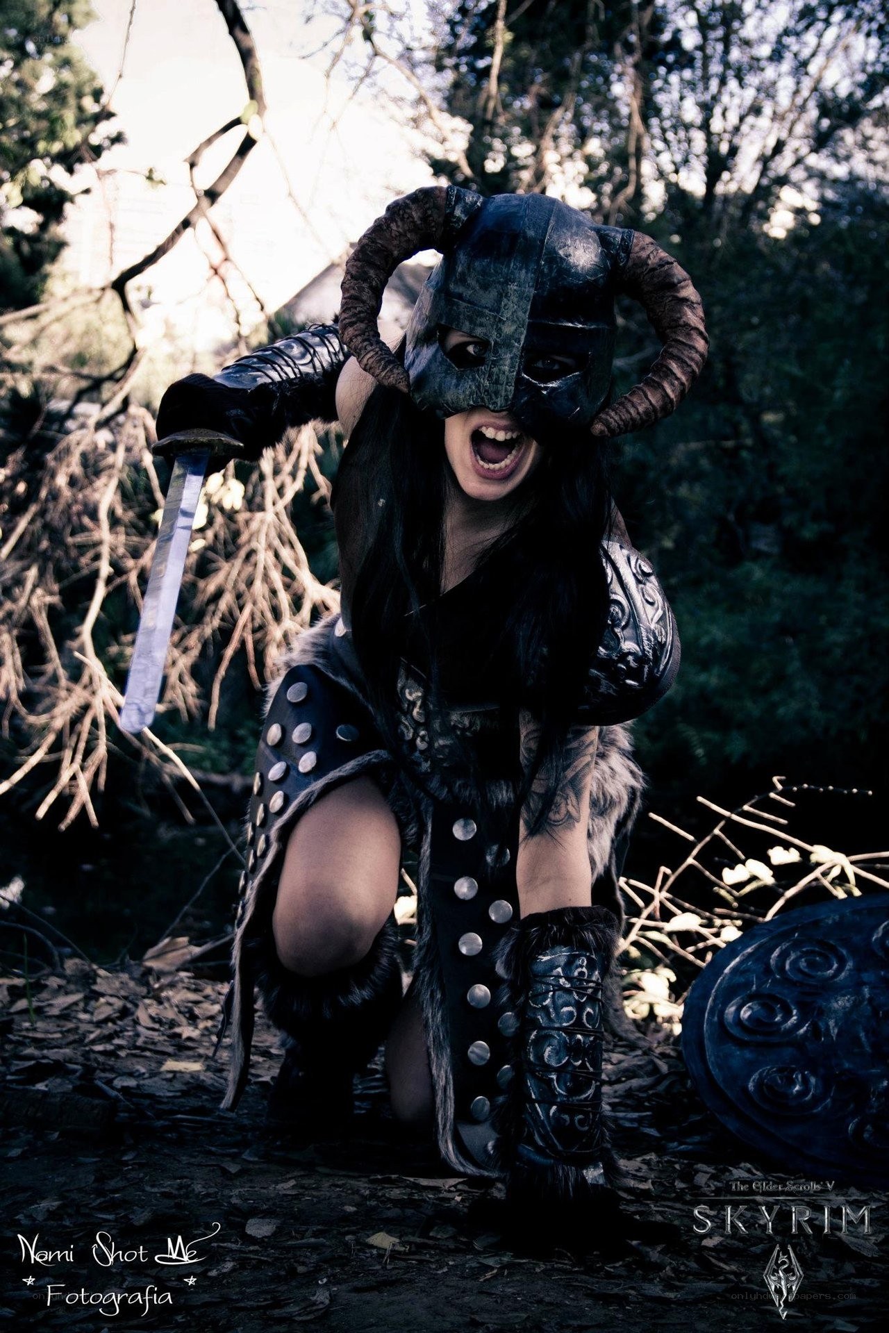 Viking warrior cosplayer in forest