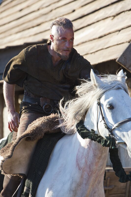 Viking warrior on white horse