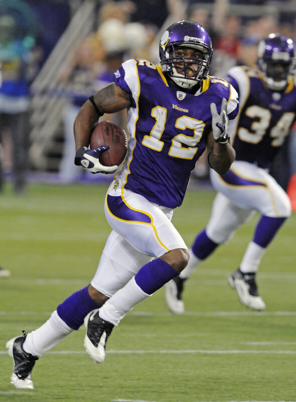 Vikings player running with ball