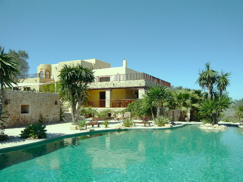 Villa with pool and palm trees