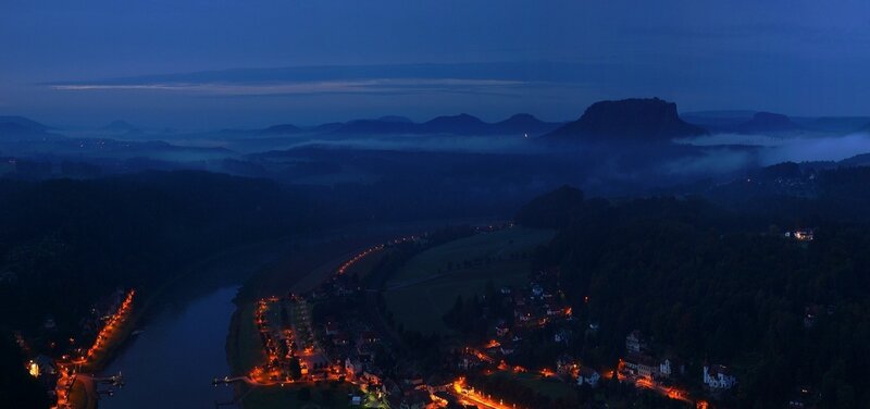 Village Along River at Night