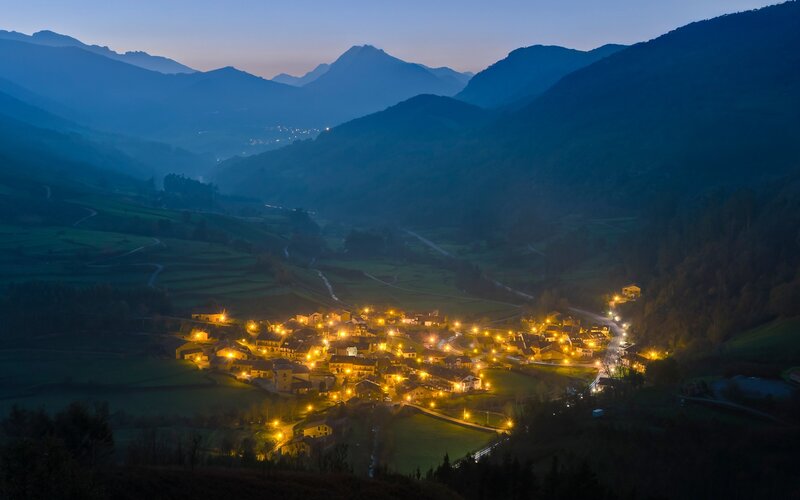 village at dusk in the mountains