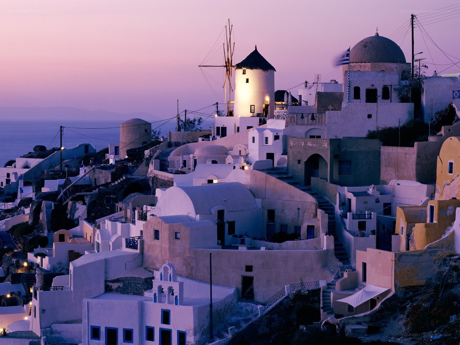 Village at dusk with windmill