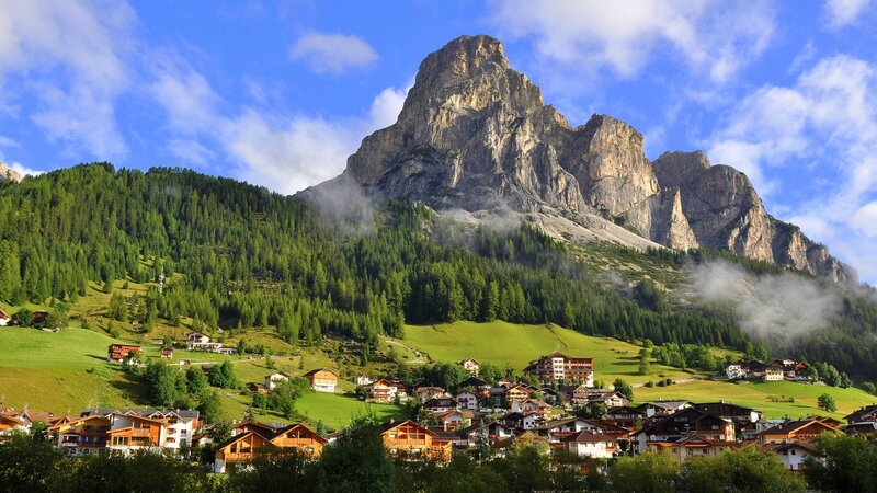Village at Mountain Base — Green, Serene, Afternoon