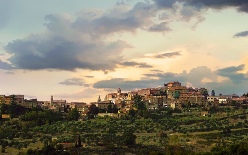 village at sunset in tuscany