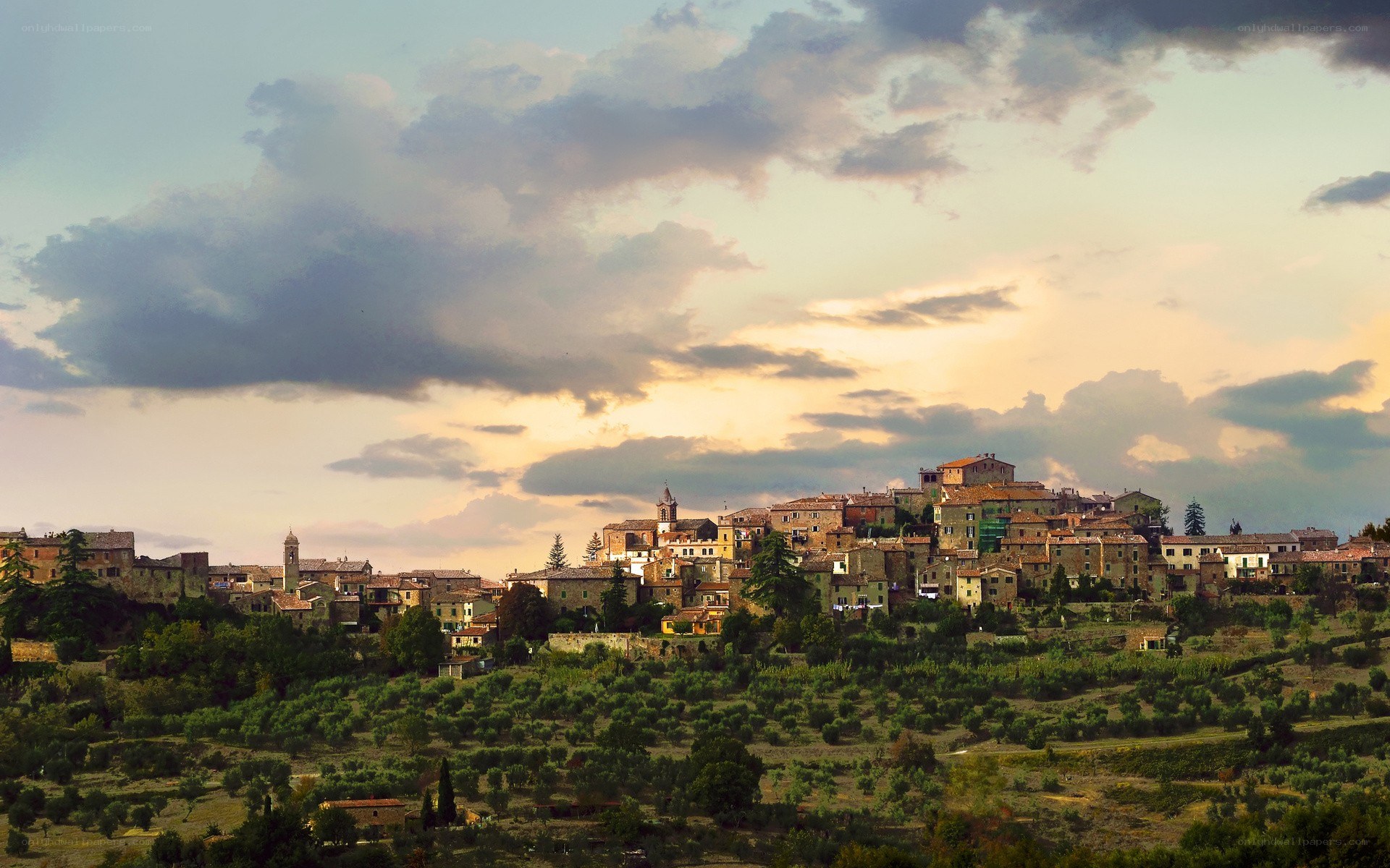 village at sunset in tuscany