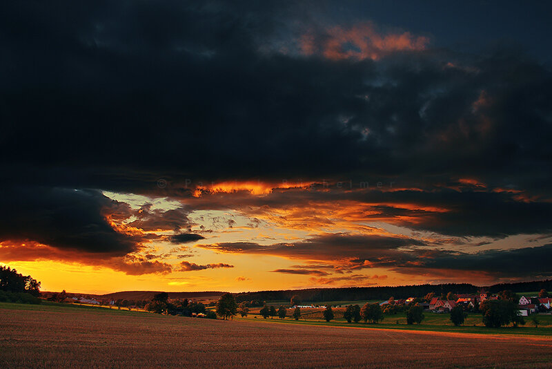 Village at Sunset — Orange, Dramatic