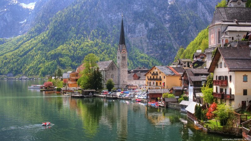 village by a lake in the alps