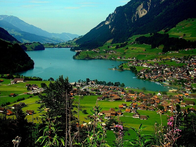 Village by a lake in the Alps