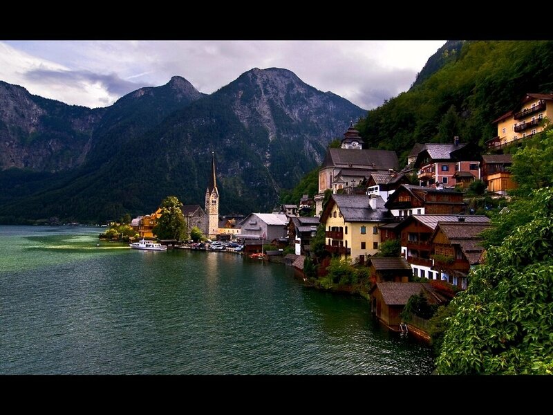 village by a lake in the mountains