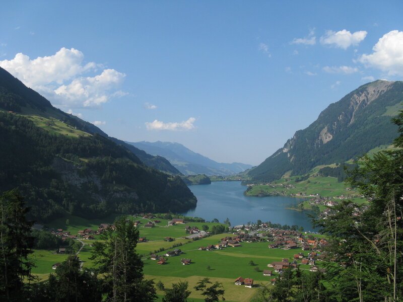 village by a lake in the mountains