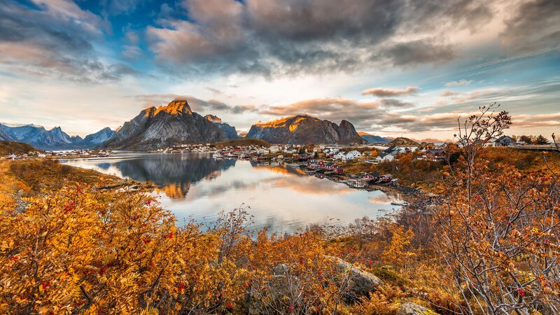 Village by Fjord at Sunset