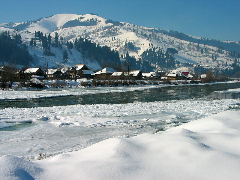 Village by Frozen River