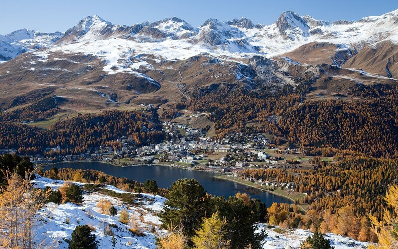 Village by Lake in Mountains