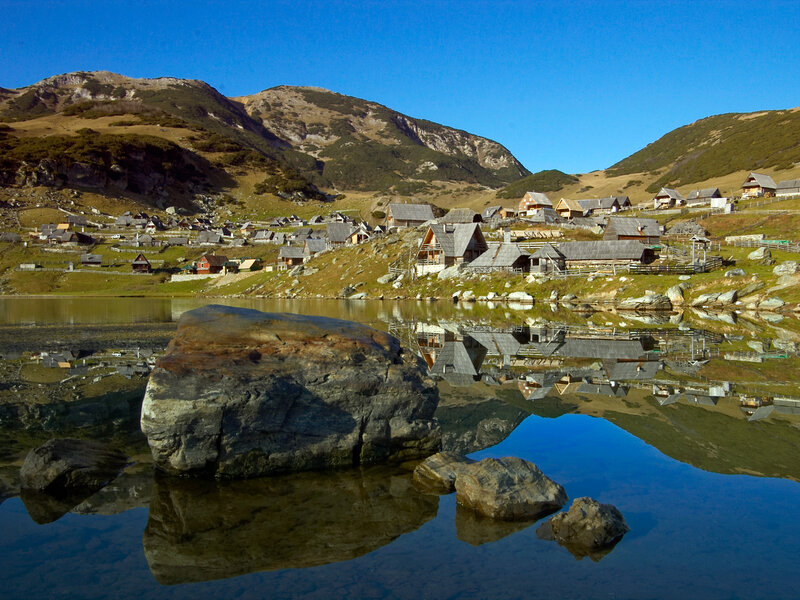 Village by Mountain Lake