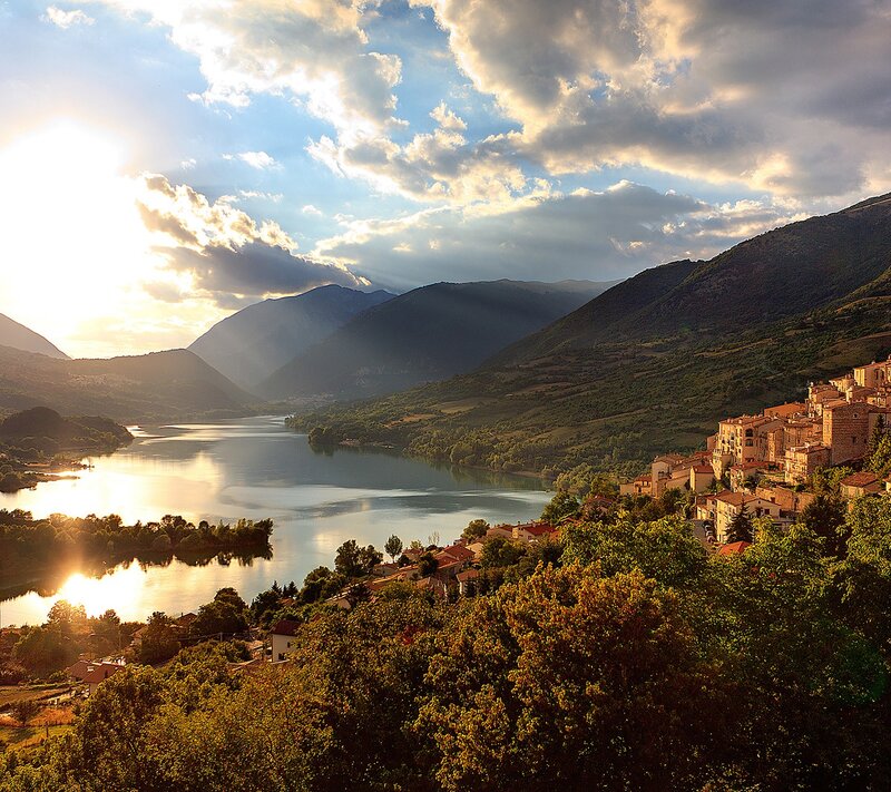 Village by the lake at sunset